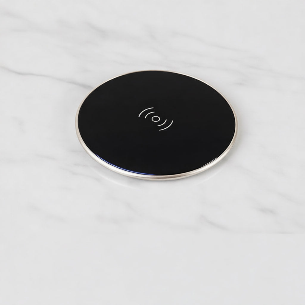 black embedded wireless charger in kitchen countertop